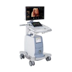 An ultrasound machine with a monitor and a plain white background.